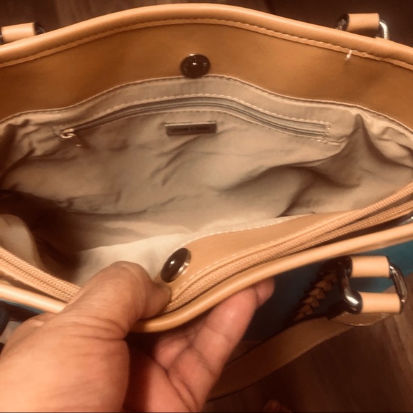 The turquoise bag has tan braided accent.  3 sections to hold your items. - Picture 3 of 5